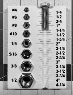 a ruler with nuts and bolts on it