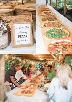 people are standing at a table with pizzas on it and there is a sign that says i love you all over the place