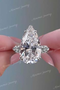 a person holding a diamond in their hand