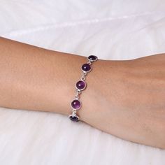 "Amethyst Bracelet / 925 Sterling Silver Bracelet / Handmade Bracelet / Adjustable Silver Jewelry / Gift For Her Gemstone Name - Amethyst  Stone Quality - AAA Bracelet Weight - 6.78 gm Stone Length - 0.6 cm , Stone Width - 0.6 cm Bracelet Length - 6 inch to 9 inch sizes are available, we give 0.5 inch adjustable in the size which you order ( NOTE - 0.5 INCH ADJUSTABLE IS INCLUDED IN YOUR ORDERED SIZE ) Stone Shape - As shown in the picture You'll get the exact product as shown in the pictures We serve complete 925 sterling silver Jewelry and genuine properties of the stone. The products are dispatched from the small business from USA. Product Quality and Packaging - Our all products are 925 Silver Stamped which shows that the product is genuine and authentic .The products are dispatched fr Silver Dainty Gemstone Bracelets, Dainty Silver Bracelet With Gemstone, Sterling Silver Jewelry With Bracelet Strap, Dainty Silver Gemstone Bracelet, Sterling Silver Round Bracelet, Silver Dainty Gemstone Bracelet, Purple Sterling Silver Bracelet As Gift, Purple Sterling Silver Bracelet Gift, Sterling Silver Beaded Bracelets With Natural Stones