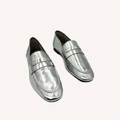 Handcrafted from premium full-grain leather these silver loafers offer a sleek polished look that effortlessly elevates any outfit. whether you're dressing up for a formal event or going casual for the weekend these versatile shoes are the perfect addition to your wardrobe. Silver Loafers, Versatile Shoes, Suede Pants, Phone Shop, Denim Hat, Dressing Up, A Perfect Circle, Engineered Garments, Kids Sleepwear