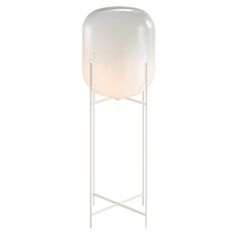 a white table lamp with a glass shade on it's base and a metal stand