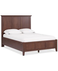 a bed with two drawers underneath it and white sheets on the headboard, in front of a white background