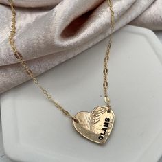 Love is always in style with our Hammered Personalized Heart Necklace. This customer favorite is ideal for initials, a date, a nickname, or a short word. The charming, vintage-style link chain is the perfect finishing touch and adds a romantic vibe. Available in sterling silver or gold finish. Chains and findings are 14kt gold fill or sterling silver. Charm is approx. 3/4 inch. Can be personalized with 6 characters max. Popular symbols for personalization are ♥ &, +(use * to symbolize the heart Puffy Heart Charms, Diamond Initial Necklace, Hand Necklace, Rose Gold Chain, Puffy Heart, Crystal Heart, Heart Charm Bracelet, 14kt Gold, Bar Necklace