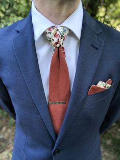 Treat yourself with a new pattern and splash of color to your look with this unique tie set. 100% Cotton Handmade Package Includes: Slim Tie Length: 59" Width: 2.80" Warm iron if needed Dapper Red Tie For Semi-formal Occasions, Dapper Semi-formal Red Tie, Multicolor Standard Tie For Semi-formal Occasions, Multicolor Suit And Tie Accessories With Pocket Square, Red Wedding Suit And Tie Accessories With Pocket Square, Red Tie With Pocket Square For Black Tie Event, Multicolor Tie With Pocket Square, Elegant Red Ties For Spring, Multicolor Ties With Pocket Square