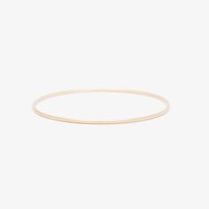 A slightly thicker version of our original gold bangle still with a dainty feel for stacking. A 1.6mm round solid 14k gold bangle.   Looking to buy 3 or more? Save with our Catch Up Pack. Classic Yellow Gold Everyday Bangle, Everyday Stackable Rose Gold Bangle, Gold Hoop Bangle In Minimalist Style, Minimalist Gold Hoop Bangle, Minimalist 14k Gold Stackable Bracelet, Stackable 14k Gold Minimalist Bracelet, Minimalist Stackable 14k Gold Bracelet, Minimalist 14k Gold Bangle, Everyday 14k Gold Bangle