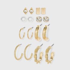 Polish off your outfits with the glam appeal of this 8-Piece Multi Gold Hoops and Cubic Zirconia Stud Earring Set from A New Day™. This eight-piece earring set includes stud earrings ranging from simple to pearl to twisted and more to make them suitable for a range of occasions. Whether worn alone or paired with other accessories, this stud and hoop earring set will add a perfect finishing touch to your looks. Target Earrings, Dr Accessories, Teen Earrings, Hoop Earring Set, Earring Sets, Xmas List, Nickel Free Earrings, Ear Cuff Earings, Easter Candy