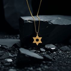 Embrace your faith and heritage with our gold Star of David pendant, meticulously crafted in the USA. Symbolizing Jewish identity and protection, each piece is a profound expression of belief and tradition. PENDANT INFORMATION This pendant is made of real, solid gold.• Made in USA• Material: 14k or 18k solid gold• Finish: polished• Height: 1.2" (30,5 mm) | *includes the small circle, bail dimensions not included• Width: 0.98" (25 mm)• Pendant weight: approx. 5 grams (14k)• Bail: fits up to 4 mm David Star, Phoenix Pendant, Star Of David Pendant, Gold Dragon, Small Circle, Solid Gold Chains, Tree Of Life Pendant, Dragon Pendant, Yellow Gold Chain