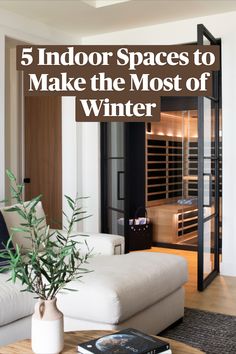 a living room filled with furniture and a book on top of a wooden coffee table