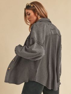 Say hello to your new favorite layering piece—The Chill Shacket! This isn’t just a button-down; it’s the wardrobe must-have you didn’t know you needed. With its sweatshirt and waffle knit fabric combo, raw edge seams, it give you that cozy lived-in look for an extra laid-back vibe. It's your new go-to! Pair it with any tee or tank, jeans or leggings, and you’ve got an effortless, comfy outfit that screams "I woke up like this!" Color: Charcoal Ladies Oversized Shacket, with a little bit of stret Trendy Oversized Washed Shacket, Everyday Washed Shacket, Casual Everyday Washed Shacket, Oversized Cotton Shacket With Buttons, Chic Washed Button-up Outerwear, Oversized Tops With Buttoned Pockets For Fall, Oversized Cotton Shacket With Snap Buttons, Oversized Spring Shacket With Button Cuffs, Spring Oversized Shacket With Button Cuffs