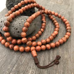 Unique and powerful Goldstone Japa mala Necklace from Nepal. A unisex piece that will be perfect for your day by day outfits and will be easy to match any other accessories. If it fits right can be a bracelet also. This is also a Buddhist praying 108 beads mala. The japa mala is 42.5cm- 16.75 inch long A unique addition to your jewelry collection. Enjoy Con salud Meditation Jewelry With Wooden Round Beads, Meditation Jewelry With Round Wooden Beads, Wooden Beads Jewelry For Meditation, Brown Gemstone Beads Bracelets For Meditation, Adjustable Polished Beads Necklace For Rituals, Adjustable Polished Bead Necklaces For Rituals, Spiritual Mala With 8mm Beads, Brown Bohemian Mala With 108 Beads, Holistic Mala With Round Beads For Festival