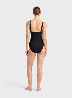 A modern classic, the Loures balconette one piece in black is cut from our luxury, Italian Sculpteur® fabric with patented 3-D stretch technology that flatters the silhouette. Loures features comfortable, wide, adjustable shoulder straps, an underwire for bust support and flattering gathers at mid bust. Ideal for those seeking tummy control, Loures is a classic swimsuit that will endure for years to come. Best suited to bust sizes B, C & D.Luxury fabric sustainably made in Italy. Classic Swimsuit, Resort Wear Dresses, Matching Separates, Luxury Fabric, Black One Piece Swimsuit, Black One Piece, Italian Fabric, Australian Fashion, Short Shirts