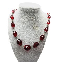 "Vintage Art Deco Red Crystal Necklace (A1079) Size: About 28\" Color: Red Condition: Fair to good vintage; Some of the crystals have imperfections and flea bites. Bead cap plating is not great. Era: Circa 1930s Signed: None Please look at all the photos, as they are part of the description. I try my best to point out any flaws. Also please remember this is a preloved piece and may show signs of light wear, marks, scratches, etc. I will be posting a lot more jewelry, Keep checking back." Red Jewelry With Lobster Clasp For Party, Red Party Jewelry With Lobster Clasp, Red Jewelry With Faceted Beads, Red Round Crystal Jewelry, Formal Red Faceted Jewelry, Formal Red Faceted Necklace, Red Faceted Jewelry For Formal Occasions, Formal Red Jewelry With Polished Beads, Faceted Crystal Round Necklaces For Party