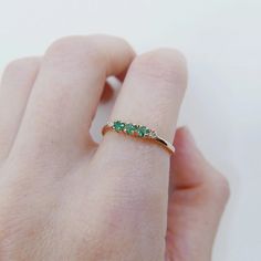 14K Gold Tiny Emerald and Diamond Eternity Band Ring - 14k Emerald Wedding Band for Women - 14k Stacking Emerald Ring - 14k Emerald Jewelry Item Detail Material : 14K Gold , Stone Metal : 14K Solid Gold  Stone : Emerald & Diamond  Size : 3mm &  2mm Shape: Round  Finish : 14k Yellow gold , 14k Rose gold , 14k White gold  Occasion:- Christmas Gift Ring, Mother's Day Gift, Valentine's Day Gift Ring, Lover gift Ring, Heart gift Ring, Promise Ring, Proposal Ring, Couple's Gift Ring, Anniversary Gifts Emerald And Diamond Band, Emerald Jewelry Ring, Emerald Ring Design, Promise Ring Proposal, Emerald Wedding Band, Wedding Band For Women, Ring Proposal, Green Emerald Ring, Ring Heart