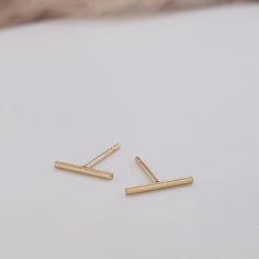 Everyday wear bar earrings for women. Available in 14k yellow gold filled and sterling silver -14K gold-filled, won't tarnish, completely waterproof -approx. 10mm Rose Gold Bar, Stocking Stuffers For Her, Cute Stud Earrings, Ring Spacer, Gold Bar Earrings, Hoop Charms, Round Pendant Necklace, Bar Studs, Layered Chains