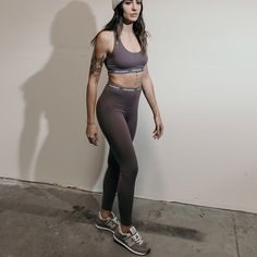 Joah Brown's Sports Legging is a technical must-have for your workout wardrobe. High-waisted and form-fitting full-length leggings with sculpting seam details and logo branded elastic waistband. Body-contouring fabric that feels like a second skin that is super soft and stretchy. Now available in sueded onyx and mauve!! Pair it with the Sports Bra to make it a set! Size Chart X/S (0-4) S/M (4-8) M/L (8-10) The Fit Model is 5'8'' wearing a size X/S Features Fabric: 76% Polyester, 24% Spandex Hugs Workout Wardrobe, Joah Brown, Racerback Bra, Body Contouring, Sports Leggings, Second Skin, Black Leggings, Scoop Neckline, Elastic Band