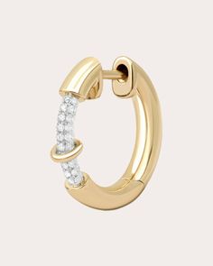 Crafted from solid 14-karat gold, this hoop earring interrupts its tubular design with pavé-set diamond embellishments and a single ring motif. From Rainbow K’s Endless Collection, modern and edgy pieces that transcend time. Sold as a single Hinge closure 14k yellow gold and white diamond Diamond carat: 0.17 ctw Diamond color: F Diamond clarity: VS Diamond cut: round Polish with soft cloth Made in Hong Kong If you would like to consult with a fine jewelry expert, please email us at jewelryconcie Two Diamonds Ring, Triple Band Ring, Constellation Ring, Single Ring, Vs Diamond, Diamond Carat, White Gold Jewelry, White Gold Band, Gold Diamond Rings