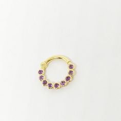 Septum Clicker Stone- Natural Amethyst - 1.6mm Inner diameter: 6mm,7mm,8mm,10mm,12mm Septum ring: 18g,16g,14g Materials: 14k solid gold 14k Yellow gold - 14k Rose gold - 14k White gold Purple Hoop Jewelry For Gift, Purple Gemstone Hoop Earrings, Fine Jewelry Purple Halo Jewelry, Purple Amethyst Hoop Jewelry, Purple Halo Jewelry As A Gift, Internally Threaded Round Nose Rings As Gift, Round Internally Threaded Nose Rings For Gifts, Round Cartilage Earrings With Birthstone For Gifts, Birthstone Cartilage Earrings Gift