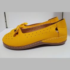 New(Other) These Shoes Are Brand New. There Is Glue Residue (Pictured.) Second To Last Photo. Brand: Rosy Color: Yellow,Tan Bottom Size: 43 Eu Or 10 Us Material: Man Made,Rubber Sole. The Bottom Heel Height Is 4 Cm Or 1.57 Inch. Very Light Weight. Beach,Summer Ready!!! Casual Yellow Leather Flats, Yellow Leather Flats With Round Toe, Casual Yellow Flats With Round Toe, Casual Yellow Round Toe Flats, Yellow Slip-on Closed Toe Flats, Yellow Slip-on Flats For Summer, Yellow Slip-on Flats For Spring, Casual Yellow Closed Toe Flats, Yellow Slip-on Flats With Rubber Sole