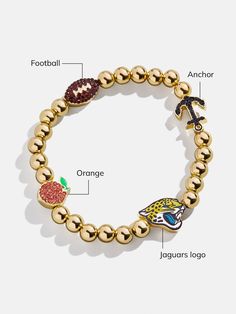 The Jacksonville Jaguars NFL Charm Bracelet is the ultimate accessory for die-hard football fans. Each bracelet is a celebration of your favorite team, featuring the Jaguars logo along with other charms related to the team and its iconic location. Perfect for game days or everyday wear, this bracelet adds a touch of sports-inspired elegance to any outfit. This bracelet features 6mm gold ball beads. This is an officially licensed NFL product. Jaguars Logo, Beaded Charm Bracelet, Game Outfit, Football Game Outfit, Jacksonville Jaguars, Bead Charm Bracelet, Football Game, Gaming Clothes, Die Hard