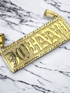 "●  10K 14K Solid Real Gold Customized Name Pendant Necklace in Frame Letter Diamond Cut Jewelry Personalized Gift For Him and Her   ●Necklace is not included, need to buy separately. ●Metal : 10K or 14K Solid Gold ●Purity : 10K or 14K with authenticity stamp ●Made in : United States ● Cut Type: Diamond Cut ●Shape :BLOCK or any customized shape as per your request. ● Fonts: Please specify fonts while placing your order, or we will do OLD ENGLISH fonts as shown in the image and video. ●Weight: Ap Engraved White Gold Custom Nameplate Necklace, Custom Gold Nameplate Jewelry, Custom 14k Gold Nameplate Necklace, Luxury Nameplate Necklace For Formal Occasions, Gold Polished Nameplate Jewelry, Luxury 14k Gold Nameplate Necklace, Luxury Gold Nameplate Necklace, Personalized Gold Jewelry With Polished Finish, Personalized Nameplate Jewelry With Polished Finish