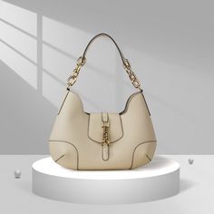 SPECIFICATIONSTypes of bags: Shoulder BagsStyle: FashionShape: HobosPlace Of Origin: GUANG DONG ProvincePattern Type: SolidOrigin: CN(Origin)Occasion: VersatileNumber of Handles/Straps: SingleModel Number: 812--443254Main Material: Genuine LeatherLining Material: PolyesterItem Type: HandbagsInterior: Interior Slot PocketInterior: Interior Zipper PocketInterior: Cell Phone PocketHardness: SoftHandbags Type: Shoulder BagsGenuine Leather Type: Cow LeatherGender: WOMENClosure Type: HaspBrand Name: M Beige Bags, Luxury Designer Bags, Female Office, Beige Bag, Purse For Women, Genuine Leather Purse, Bags Fashion, Types Of Bag, Bag Handle