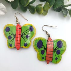 Butterfly Carved And Painted Wood Bright Colorful Dangle Pierced Earrings Lightweight Painted Yellow, Red, Blue And Green Carved Wood Butterfly Dangle Earrings On Fish Hook Ear Wires. Unsigned. Drop Length Is Approximately 2 1/2”, Width 2”. Nwot. New Without Tags With Tarnished Ear Wires. Bundle To Save. I Offer A Discount On Bundles With Discounted Or Free Shipping. Offers And Counteroffers Are Always Welcome! Fast Shipper, Smoke-Free, Kitty Friendly Home. I Ship 6 Days A Week, Excluding Sunday Fun Yellow Hand Painted Earrings, Trendy Green Hand-painted Earrings, Colorful Hand-painted Dangle Jewelry, Vibrant Green Dangle Earrings, Playful Hand-painted Dangle Earrings, Wood Butterfly, Green Butterfly, Handmade Artisan, Earings Piercings