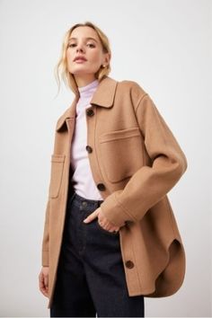 This oversized shirt jacket by Rails is the perfect fusion of cozy and chic! This style features a dropped shoulder, patch pockets, horn buttons, and side slits at the hem for breathability. Available in a rich camel-colored wool blend. Oversized Brown Outerwear With Buttoned Pockets, Oversized Beige Shacket With Lapel Collar, Neutral Outerwear With Patch Pockets And Long Sleeves, Neutral Wool Outerwear With Pockets, Neutral Long Sleeve Outerwear With Patch Pockets, Oversized Wool Button-up Outerwear, Brown Lapel Collar Shacket For Work, Brown Shacket With Lapel Collar For Work, Oversized Workwear Shacket With Flap Pockets