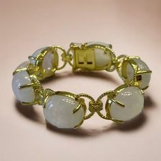 "Lower prices on our main website: https://discomarshmallow.myshopify.com/ Introducing our Sicilian Moonstone Cabochon Bracelet, a blend of history and elegance. The heart of this bracelet holds cabochon moonstones, a classic shape cherished for centuries. These stones have a rich history as they were treasured by ancient civilizations. The gold design is inspired by Sicilian ropes, adding a touch of the island's heritage. What makes this bracelet truly special is its customization. You can choo Luxury Crystal Gemstone Bracelet, Luxury Crystal Bracelet, Elegant Formal Bracelets With Natural Stones, Elegant Moonstone Round Stone Jewelry, Elegant Crystal Bracelet With Natural Stones, Wedding Bracelets With Gemstone Accents, Luxury Oval Bracelets With Natural Stones, Diamond Bracelets With Gemstone Accents, Luxury Wedding Bracelets With Gemstone Accents