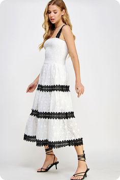 Lace trimmed long dress in embroidered eyelet lace fabric. This style features a smocked fitted bodice, contrast color scallop lace trim at skirt/straps, side pockets and adjustable straps. -lined -lightweight Fabric Contents - 100% polyester -Hand wash, dry flat -Colors may vary from different viewing devices. Tiered Lace Trim Dress For Vacation, Spring Cotton Dresses With Contrast Lace, Elegant Smocked Dress With Lace Trim For Spring, Summer Tiered Dress With Scalloped Lace, Tiered Lace Trim Dress For Daywear, Casual Dresses With Lace Trim And Spaghetti Straps, Lace Beach Dress With Ruffled Straps, Spring Tiered Dresses With Crochet Trim, Beach Dress With Lace And Ruffled Straps