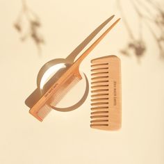 Did you know that plastic combs cause static frizz because they have a positive electrical charge?! Wood and bamboo both have a neutral charge. Which means no mad scientist hair or pesky fly-aways. Natural combs effortlessly detangle both dry and wet hair for a sleek, smooth finish. And of course both materials are fully compostable and zero waste. Specifications: All purpose comb: Made from bamboo. 2"x 5" Fine tooth comb: Made from wood. 1" x 8.5" Hair Comb Photography, Comb Product Photography, Bamboo Comb, Wooden Wide Tooth Comb, Fine Tooth Comb, Bamboo Hair Brush, Hair Quiz, Wooden Comb, Hair Supplies