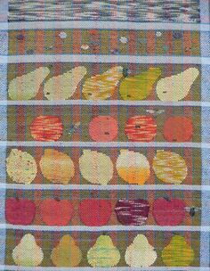 an old quilt with apples and pears on it