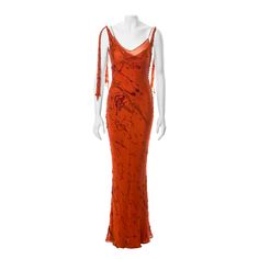 ▪ John Galliano evening dress ▪ Fall-Winter 2000 ▪ Constructed from orange bias-cut crinkled silk devoré ▪ Velvet and French-knot embroidery paint splatter motifs ▪ Silk chiffon underdress ▪ Cowl neck ▪ 3 Ties knot on the shoulder ▪ Multiple fabric buttons ▪ Floor-length flared skirt ▪ FR 38 - UK 10 ▪ Made in France All photographs in this listing EXCLUDING any reference or runway imagery needs the credit of the copyright owner if you want to perform certain acts, such as copying the images or s Orange Runway Dress, Orange Dresses Formal, Orange Vintage Dress, Dress Fw, Paint Splatter Dress, Orange Silk Dress, Knot Embroidery, Burnt Orange Dress, Bias Cut Dress