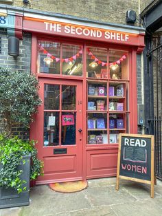 The Second Shelf bookshop in london with pink door London Bookstores, Bookstores In London, London Bookstore, Beautiful Library, Storefront Design, Artificial Christmas Garland, Cool Vibes, Travel Books