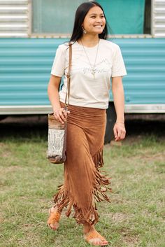 Brown Fringe Asymmetric Wrap Suede Midi Skirt Brown Asymmetrical Maxi Skirt For Spring, Casual Brown Asymmetrical Skirt, Brown Asymmetrical Skirt For Fall, Casual Asymmetrical Relaxed Skirt, Casual Asymmetrical Hem Skirt For Fall, Casual Flowy Wrap Skirt For Fall, Relaxed Asymmetrical Maxi Skirt For Fall, Fall Asymmetrical Relaxed Maxi Skirt, Asymmetrical Spring Festival Skirt