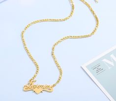 Personalize this lovely high grade stainless steel figaro chain nameplate necklace with the name of your choice. The perfect gift for yourself or a loved one. 18k Stainless Steel Nickel and Lead Free Hypoallergenic ** Please allow about 7-14 business days for processing of all custom orders and 3-10 business days shipping time. Trendy Personalized Yellow Gold Name Necklace, Customized Nameplate Chain Necklace, Figaro Chain Nameplate Jewelry For Anniversary, Personalized Heart Pendant Chain Necklace As Gift, Trendy Figaro Chain Necklaces Gift, Elegant Nameplate Necklace With Figaro Chain, Trendy Personalized Chain Necklace For Valentine's Day, Trendy Personalized Chain Necklace For Gift, Trendy Figaro Chain Necklace As Gift