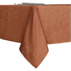 a brown table cloth on top of a white plate