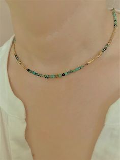 Very delicate and elegant faceted African turquoise necklace choker  with high quality 18k. gold plated  chain and high quality  tiny hematite beads ( don't change color) This necklace is perfect for layering.      Neclace assembled on a very durable jewelry wire.      Necklace length-15.3 in.+2 in.  extension chain     Nickel-free stainless steel lobster clasp.  Excellent gift idea for women. Gold Chain Beaded Necklace, Gold Adjustable Minimalist Turquoise Necklace, Minimalist Adjustable Gold Turquoise Necklace, Adjustable Minimalist Gold Necklace, Dainty Handmade Gold Turquoise Necklace, Handmade Dainty Gold Turquoise Necklace, Gold Turquoise Necklace With Round Beads, Gold Turquoise Necklace With Colorful Beads As Gift, Adjustable Gold Turquoise Necklace With Colorful Beads