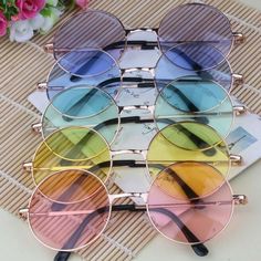 Golden Frame Round Sunglasses. Glasses Hippie Shades Lennon. Colors: Orange, Violet, Blue, Green, Yellow, Pink. Select Your Preferred Color. Brand New. Accessories Minimal, Sunglasses For Your Face Shape, Circle Glasses, Cat Eye Colors, Circle Sunglasses, Colored Glasses, Cute Sunglasses, نظارات شمسية, Cute Glasses