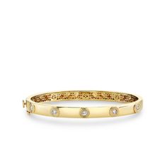 14k yellow gold multi bangle features five fluted diamond on one side only. 14k gold bracelet measures 6 1/4" in diameter and approximately 1/4"H X 2 1/2"W. Classic Yellow Gold Bangle With Diamond Accents, Classic Yellow Gold Bangle With Single Diamond, Classic Yellow Gold Diamond Bangle, Classic Single Cut Diamond Cuff Bangle Bracelet, Classic Single Cut Diamond Cuff Bangle, Classic Bangle With Single Diamond For Anniversary, Luxury 14k Gold Bangle With Single Diamond, Classic Single Diamond Bangle For Anniversary, Classic Anniversary Bangle With Single Diamond