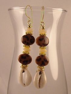 Brown Round Bead Earrings For The Beach, Brown Beaded Earrings For Beach, Brown Round Beads Earrings For Beach, Brown Round Beaded Earrings For Beach, Bohemian Bronze Earrings With Round Beads, Bohemian Brown Beaded Brass Earrings, Bohemian Gold Beaded Earrings With Ear Wire, Gold Bohemian Beaded Earrings With Ear Wire, Bohemian Gold Jewelry With Spacer Beads