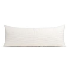 a white pillow with pleated edges on the front and back of it, against a white background