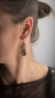 Beautiful handmade amber drop earrings for everyday wearing! :) All our items have been handmade with love and care more than 35 years ago by our family member - uncle Alfreds Holsts using the amber which he acquired in his lifetime. The amber that has been used making these rings, pendants, earrings and bracelets comes from the coast of the Baltic Sea (from 40,000,000 to 60,000,000 years old), which is the best-known and called succinite amber for containing a substantial amount of succinic aci Unique Baltic Amber Jewelry For Gifts, Handmade Baltic Amber Jewelry For Gifts, Handmade Baltic Amber Jewelry Gift, Vintage Amber Drop Earrings, Elegant Wire Wrapped Amber Earrings, Elegant Amber Wire Wrapped Earrings, Unique Amber Jewelry With Matching Earrings, Amber Drop Earrings For Gift, Unique Wire Wrapped Earrings As A Gift