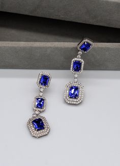 Square Cubic Zirconia drop bridal earring, bridesmaid earring. They are brass with silver, gold or rose gold color plating, lead and nickel free, pierced post backs. it is measured 2 inches long and 0.5 inches at the widest. Marabella Bridal offer square CZ in color Clear, Ruby, Sapphire, Emerald, all small rounded CZ remain clear for you to best match your dress. Our Jewelry is made with premium quality metal and plating, it is light weight and Eco friendly. Formal Cubic Zirconia Drop Earrings, Silver Plated Chandelier Earrings For Formal Events, Silver Plated Chandelier Earrings For Formal Occasions, Silver Chandelier Earrings For Formal Occasions, Formal Drop Linear Earrings With Plating, Drop Linear Earrings With Plating For Parties, Formal Metal Bridal Dangle Earrings, Metal Drop Linear Earrings For Wedding, Metal Drop Earrings For Wedding