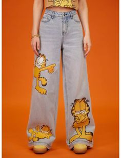 Get cat walk ready with these Garfield denim pants! They have a light wash and wide leg silhouette. Bursting with cat-titude, these pants feature Garfield printed on the legs in various poses. Comes with classic 5-pocket styling. Garfield Pjs, Garfield Outfit, Garfield Aesthetic, Tiktok Aesthetics, Garfield Costume, Artsy Clothes, Barista Outfits, Dream Inspiration, Wide Leg Denim Pants