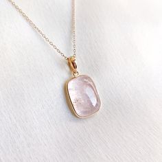 This stunning Pendant is set in 14k Solid Yellow Gold with Natural Morganite with utmost precision. It is a unique gemstone Pendant for nearly every occasion and is completely hassle-free jewelry. ITEM DETAILS: * Gem: Morganite * Gem Size: 15X15mm * Gem Shape: Square * Gem Weight: 9.20 carats * Gold Purity: 14KT * Gold Weight: 0.60 gram * Total Weight of the Pendant: 2.44 gram The Gold purity is guaranteed and it comes with authentic 14KT gold hallmark. Since my items are handmade, they are absolutely nickel and lead free. CUSTOMIZATION: * Gemstone customization is available and it can be substituted with a gem of your choice. Kindly message me for the same. PACKAGING * The Pendant comes with layers of safe and secure wrapping along with Free handmade jewelry box with every purchase. ➡️Hea 14k Gold Jewelry With Gemstone Accents For May Birthstone, Exquisite Yellow Gold Gemstones For Gifts, 14k Gold Briolette Gemstones For Gift, 14k Rose Gold Rectangular Pendant, Fine Jewelry With Rectangular Gemstone Accents, Fine Jewelry With Gemstone Accents Rectangular Shape, Gold Faceted Rectangular Stone Jewelry, Gold Faceted Jewelry With Rectangular Stone, Elegant Jewelry With Rectangular Pendant And Natural Stones