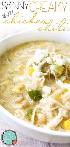 a white bowl filled with chicken and vegetable soup