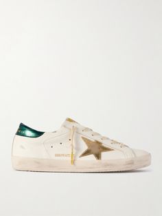 EXCLUSIVE AT NET-A-PORTER. Golden Goose's 'Super-Star' sneakers have been a fan favorite since their debut in 2007. This version is made from smooth white leather contrasted by metallic trims, including the signature applique and heel tab. They're distressed by hand and have metal-tipped laces. Goose Sneakers, Golden Goose Sneakers, Golden Goose Shoes, Golden Goose Deluxe Brand, Jo Malone London, Star Sneakers, Super Star, Shoe Closet, Distressed Leather