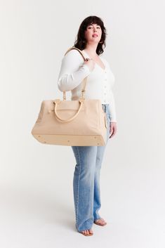 Béis 'The Commuter Backpack' In Beige - Beige Commuting Backpack For Work On-the-go Travel Bag With Leather Trim And Double Handle, Modern Weekender Bag With Leather Handles For On-the-go, Functional Weekender Tote Bag With Leather Handles, Everyday Duffle Bag With Leather Trim, Everyday Tote Duffle Bag With Leather Handles, Versatile Satchel Travel Bag For On-the-go, Everyday Tote Gym Bag With Luggage Sleeve, Versatile Diaper Bag With Luggage Sleeve For On-the-go, Everyday Large Capacity Duffle Bag With Double Handle