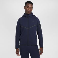 The iconic Tech Fleece Windrunner Hoodie is back. This version has the utility sleeve pocket, hem and cuff binding, and taped chevron that made the original stand out in the streets. Nike Zip Up Hoodie Men, Blue Nike Tech, Nike Tech Fleece Pants, Nike Tech Fleece Hoodie, Tech Fleece Hoodie, Nike Sportswear Tech Fleece, Nike Sweats, Nike Tech Fleece, Nike Tech